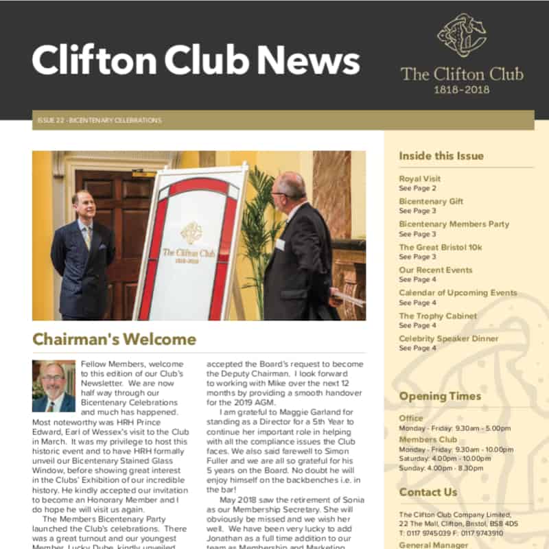 Two men in formal attire smiling and shaking hands in the foyer of a club, featured in a newsletter with various articles and event announcements for club members.